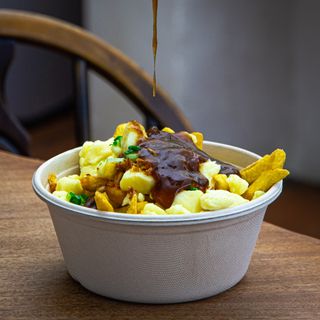 A bowl of authentic Canadian poutine at the Green Dragon in Bungay