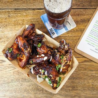 Deep fried chicken wings in barbecue sauce at the Green Dragon in Bungay